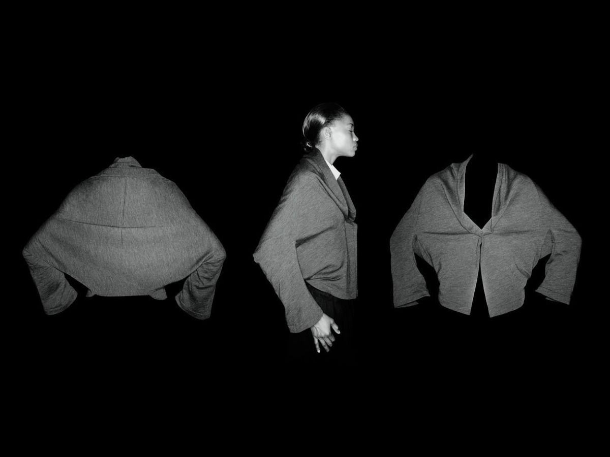 Back, right side, and front views of the jacket on a black background. Only the side view shows a person wearing it. 