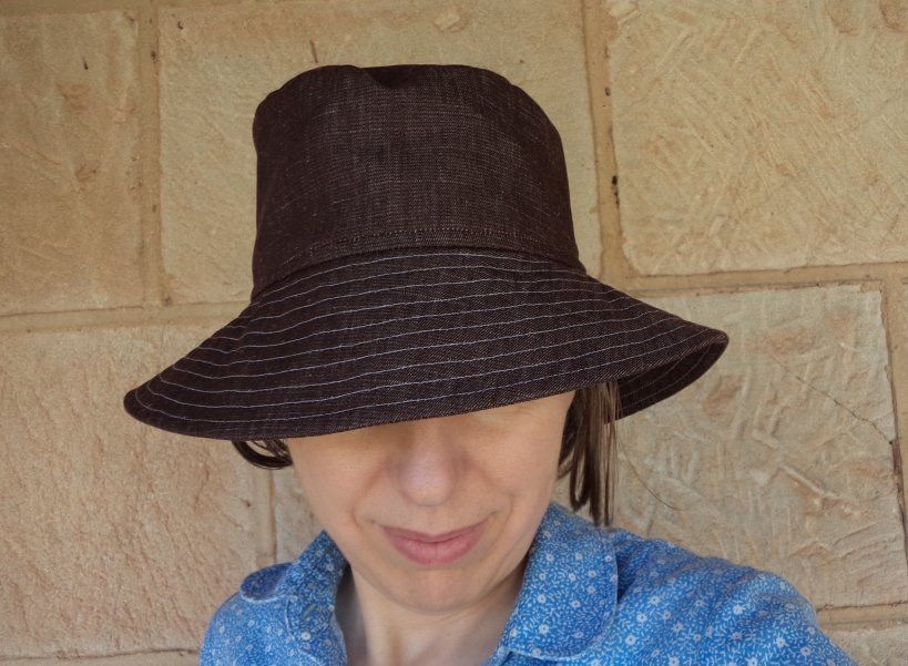 A brown bucket hat on Liz Haywood’s head.