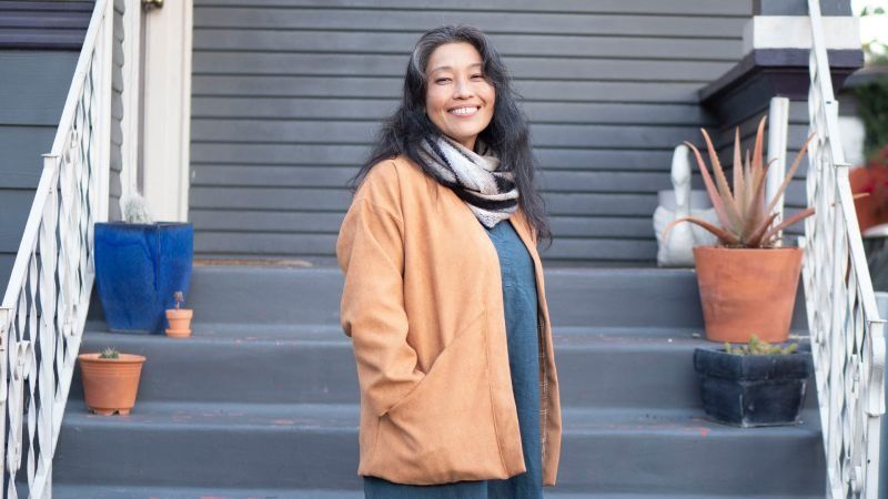 Sanae Ishida wearing a Hanten coat made in her Creativebug class Draft and Sew the Hanten Coat